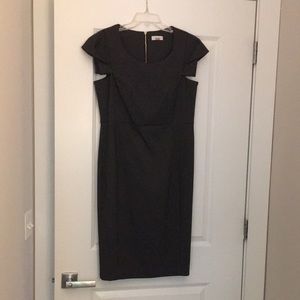 Black polka dot knee length dress